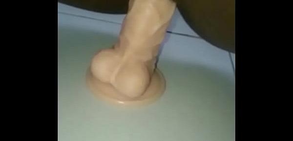  Close up black pussy dildoed